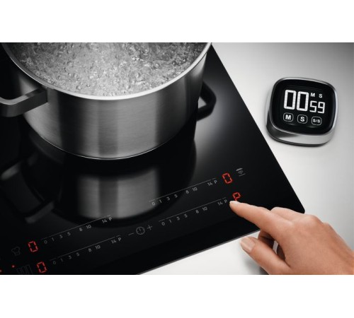 Индукционная варочная поверхность Electrolux EIV634 черный Индукционная варочная поверхность Electrolux EIV634 черный